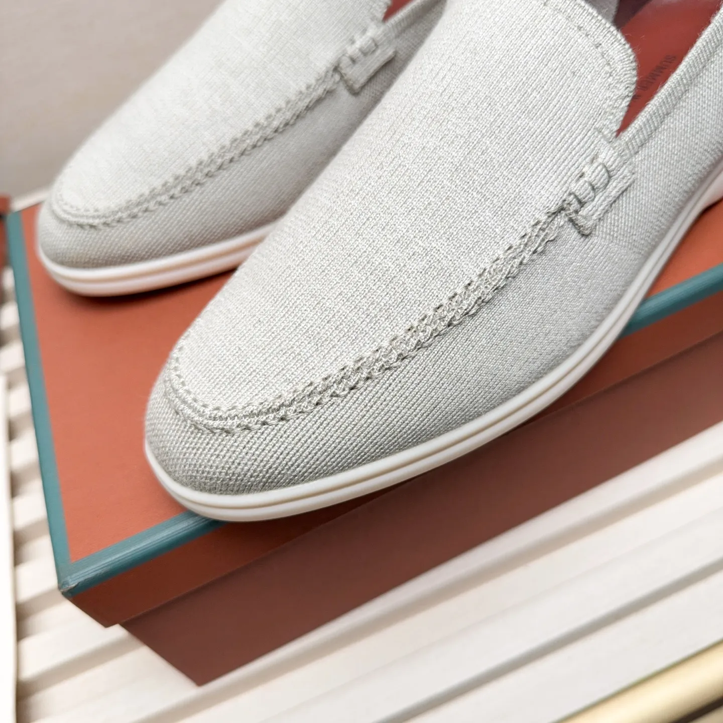 Men's Men's Shoes 💰400 Loro PIana moccasins are made of wish wool fabric. The upper is made of knitted fabric, made on a loom, and then attached to a rubber sole. The Rain System's water-repellent treatment enhances the shoe's functional design, while the suede details give the shoe a sense of elegance and sophistication. Made from Wish, fine wool from Australian and New Zealand Merino sheep